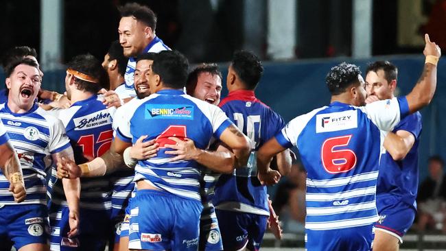 Cairns Brothers celebrate winning the FNQRL A grade premiership after beating the Ivanhoe Knights 18 points to 14 in the grand final match at Barlow Park. Picture: Brendan Radke