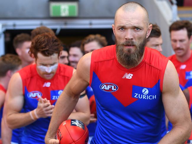 GOLD COAST, AUSTRALIA - SEPTEMBER 19: Max Gawn of the Demons leads his team out onto the field during the round 18 AFL match between the Essendon Bombers and the Melbourne Demons at Metricon Stadium on September 19, 2020 in Gold Coast, Australia. (Photo by Quinn Rooney/Getty Images)