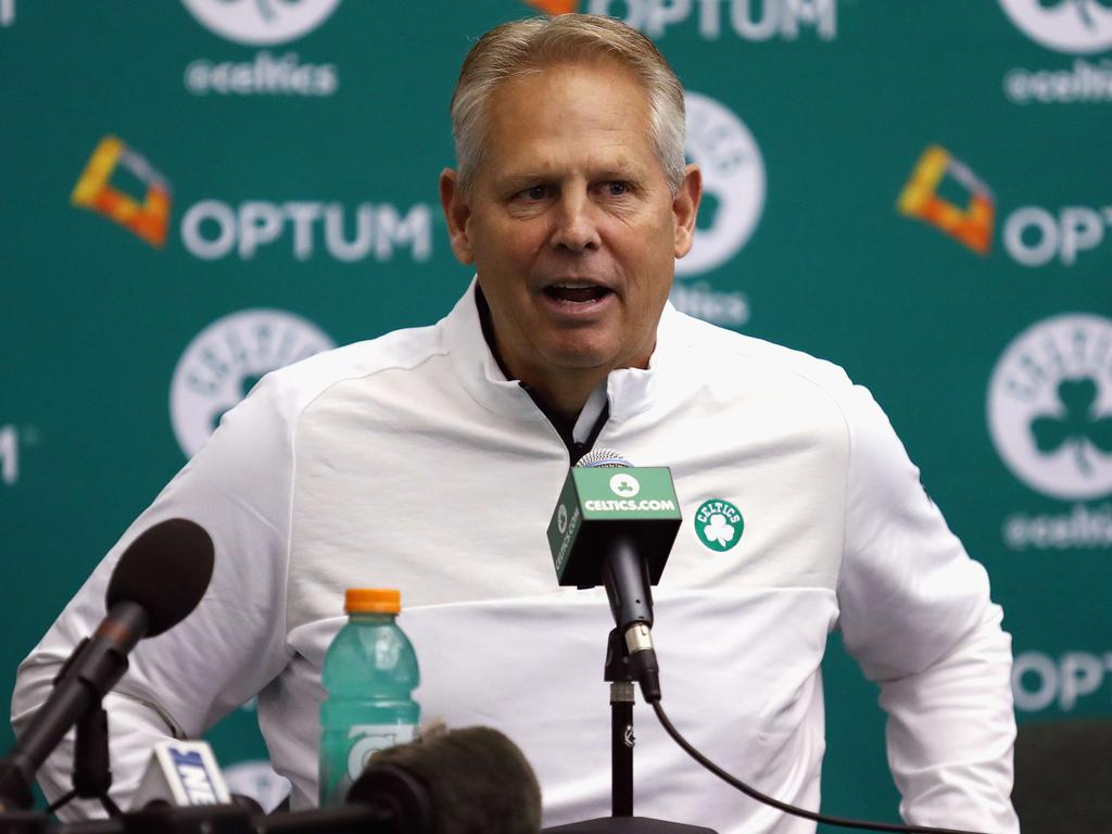 Danny Ainge is on the bed.