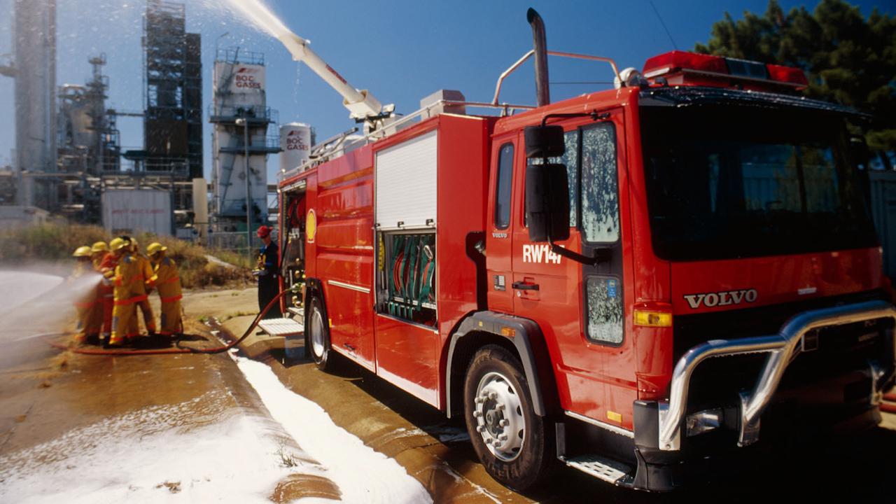 A Volvo firefighting truck spraying foam during training execise in 2000.