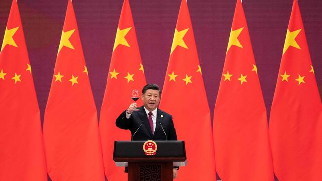 Xi Jinping raises his glass and proposes a toast at the end of his speech during the welcome banquet for leaders attending the Belt and Road Forum at the Great Hall of the People in Beijing in 2019. Picture: AFP.