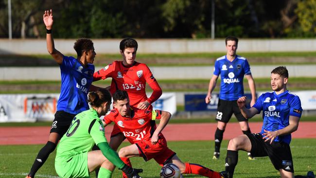 Adelaide United’s youth team in action in an NPL clash against Adelaide Comets at SA Athletics Stadium (AAP Image/Keryn Stevens)