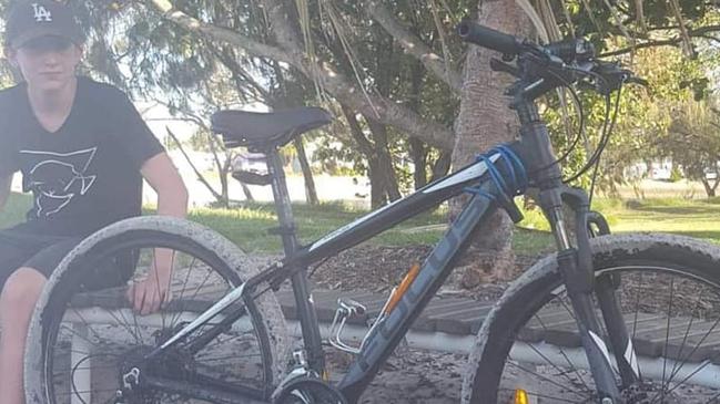 Tina Kalamara's son, 15, with his bike which missing from outside Southport police station on Saturday night. Picture: Tina Kalamara