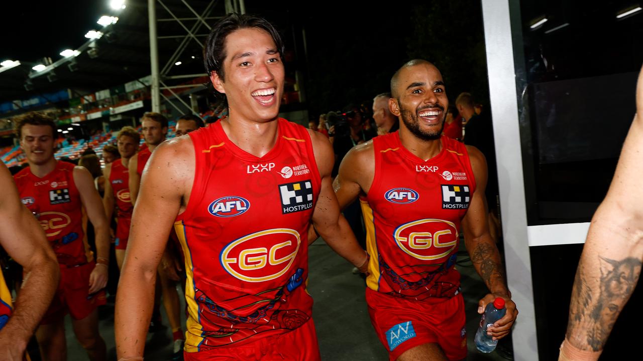 DARWIN, AUSTRALIA - MAY 16: Alex Davies (left) and Touk Miller of the Suns celebrate during the 2024 AFL Round 10 match between The Gold Coast SUNS and The Geelong Cats at TIO Stadium on May 16, 2024 in Darwin, Australia. (Photo by Michael Willson/AFL Photos via Getty Images)