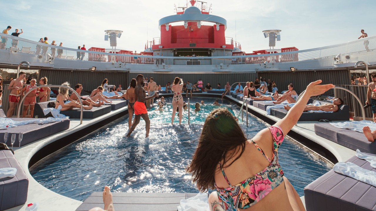 People enjoying a pool party at the Aquatic Club pool. (credit: @thefraserjames)