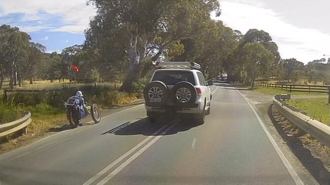 A horrifying near-miss involving a truck, a cyclist and a 4WD was captured on dashcam video on Main South Rd at Wattle Flat. Picture: Supplied