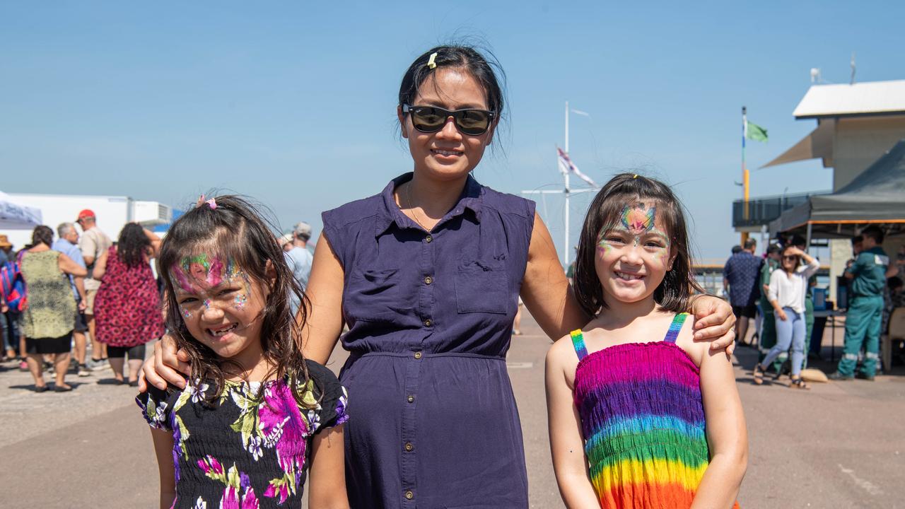 Saeng, Gabriel and Madelyn at the first HMAS Coonawarra open day in seven years. Picture: Pema Tamang Pakhrin