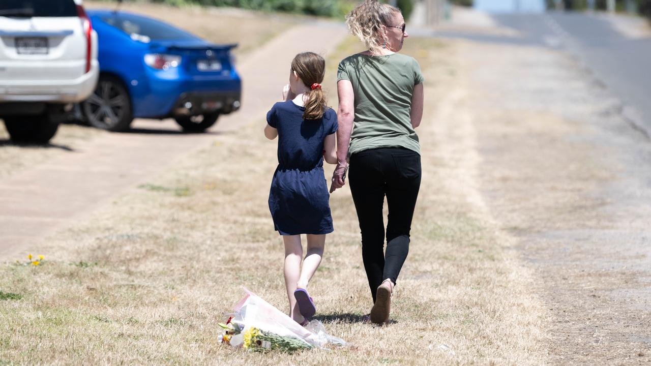 Mourners at the scene of the alleged hit-run at Goolwa. (The Advertiser/ Morgan Sette)