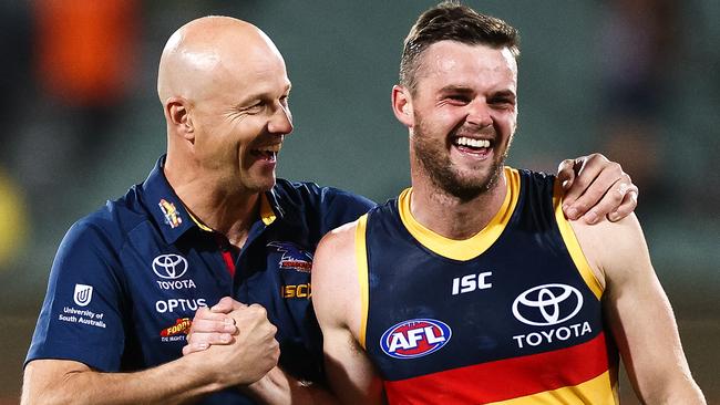 Adelaide Crows coach Matthew Nicks celebrates with Brad Crouch.