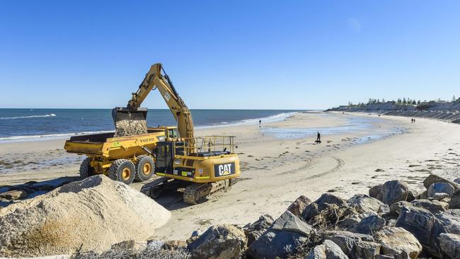 A truck unloads sand at West Beach boat ramp. Picture: Roy VanDerVegt