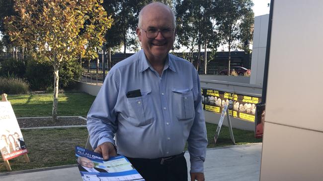 Greenway Liberal candidate Allan Green hands out how-to-vote flyers in Stanhope Gardens on Election Day. Picture: Kate Lockley