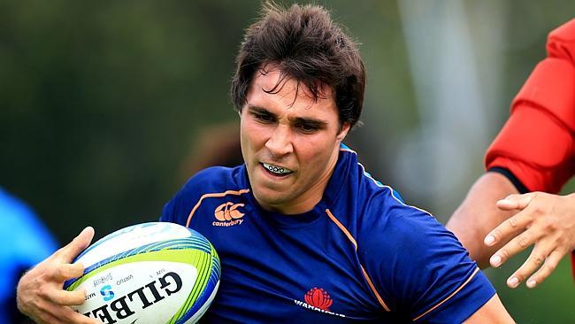 Nick Phipps runs the ball during a Waratahs training session at Moore Park