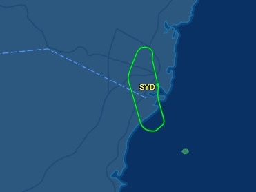 A flight map for QF643 shows it circling over Sydney Airport. Picture: FlightAware