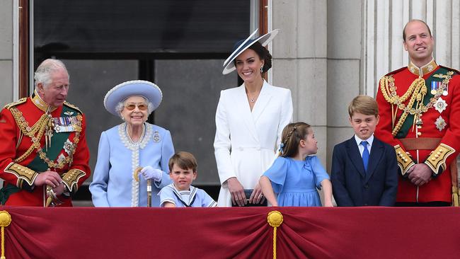 Queen Elizabeth with Prince Charles, left, and to the right Prince Louis, Kate Middleton, Princess Charlotte, Prince George and Prince William. Picture: AFP