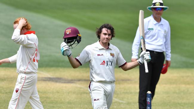 Queensland’s Sam Heazlett celebrates a century during day four of the round two JLT Sheffield Shield against South Australia at Adelaide Oval.  Picture: AAP/David Mariuz).