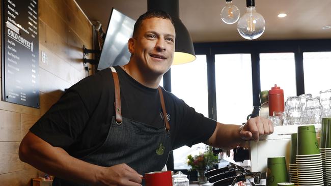 DAILY TELEGRAPH 30TH SEPTEMBER 2024Pictured at his cafe at Kyeemagh in Sydney is former Roosters NRL player Kane Evans.Picture: Richard Dobson