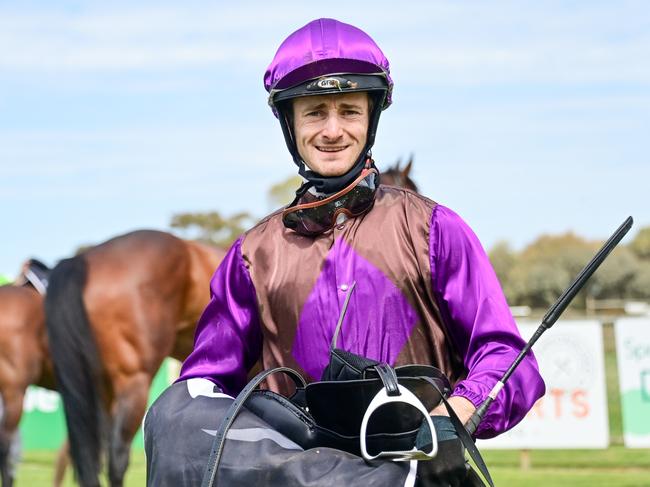 Josh Richards  after winning the Brewery Fresh Carlton Draught BM58 Handicap at Echuca Racecourse on October 22, 2021 in Echuca, Australia. (Brendan McCarthy/Racing Photos via Getty Images)