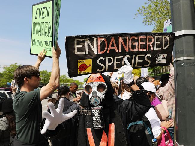 Protesters gather near the USS Intrepid, where President Donald Trump is scheduled to host Prime Minister Malcolm Turnbull Thursday night. Picture: Spencer Platt/Getty Images/AFP