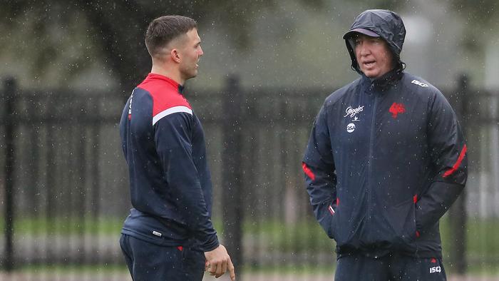 SYDNEY, AUSTRALIA - JULY 27: Roosters coach Trent Robinson (R) talks to James Tedesco (L) during a Sydney Roosters NRL training session at Kippax Lake on July 27, 2020 in Sydney, Australia. (Photo by Matt King/Getty Images)