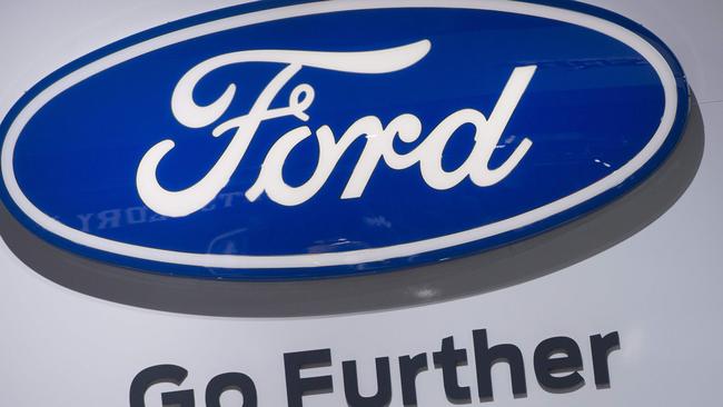 (FILES) In this file photo taken on January 10, 2017 the Ford logo is seen during the 2017 North American International Auto Show in Detroit, Michigan. Environmental groups on May 8, 2018 targeted Ford Motor Co. over its stance on the US clean fuel standard, delivering a petition with 250,000 signatures urging the automaker to drop support for weaker emission rules. With the battle over fuel-economy rules growing more intense, Madeline Page of Public Citizen, which helped organize the on-line petition, said the Ford was singled out because of the "hypocrisy" of its position.  / AFP PHOTO / SAUL LOEB