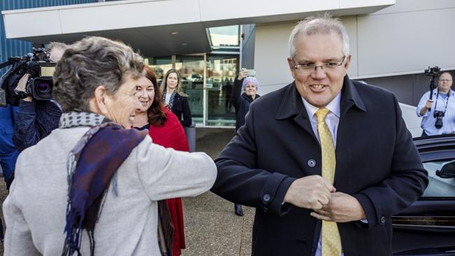 Prime Minister Scott Morrison and Liberal candidate for Eden-Monaro Fiona Kotvojs tour Electro Optics Sydneys (EOS) in Canberra. Picture: Sean Daveuy.