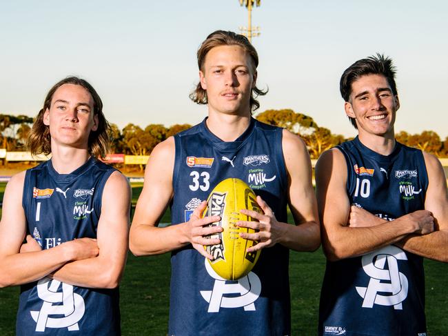 South Adelaide under-18s Isaac Birt, 17, Arlo Draper, 18, and Dylan Brown, 17, at South Adelaide Football Club ahead of the SANFL live stream preview in Adelaide, April 27, 2021. (The Advertiser/ Morgan Sette)