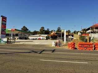 ONGOING: Project manager explains why roadworks at the new service centre on Brisbane St, West Ipswich have been delayed. Picture: Inga Williams