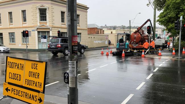 Crews work to restore water to much of Launceston's CBD after a water main burst on Wellington St. Picture: PATRICK GEE