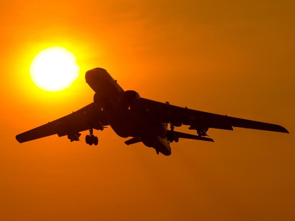 A Chinese H-3K strategic bomber takes off into a red dawn. China has been dramatically increasing its military presence along its southern borders. Picture: Chinese State Media