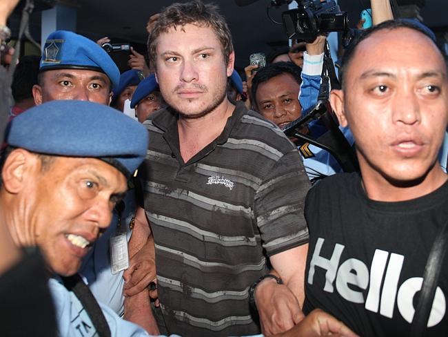 Attempted to enter cockpit ... Matt Lockley was arrested and is taken to police at the airport in Denpasar, Bali.