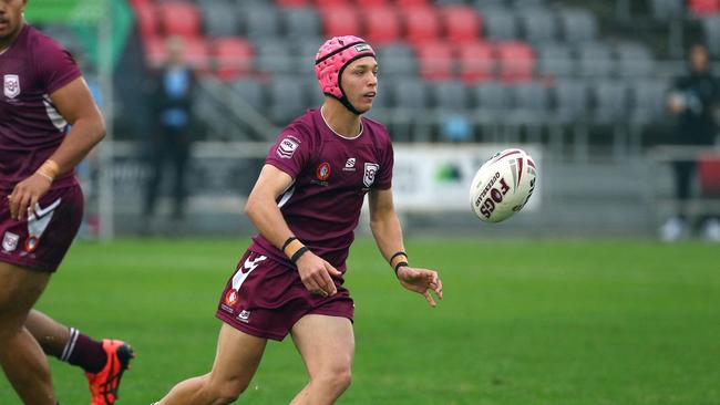 Action from the Australian state schools national rugby league championship match between Queensland Maroon and NSW CHS. Braithen Scott attacks. Picture: Tertius Pickard