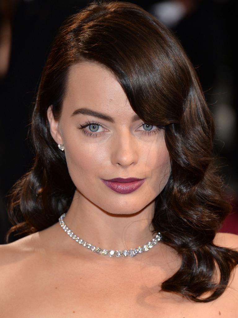 Margot Robbie was sultry and stunning at the 2014 Oscars wearing a jaw-dropping set of diamond jewells designed by Forevermark work around $8 million. Picture: Getty