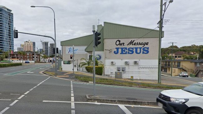 A man has been found dead behind a church on the Gold Coast.