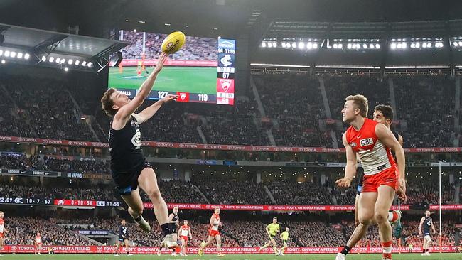 Blake Acres gets a finger on it. (Photo by Michael Willson/AFL Photos via Getty Images)