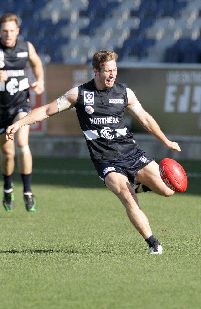 Going places: Kane Lambert takes a kick for the Northern Blues.