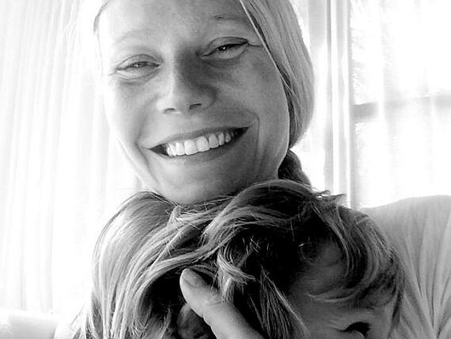 Gwyneth Paltrow tweeted a picture of herself hugging her son while still wearing her wedding band after announcing her separation.