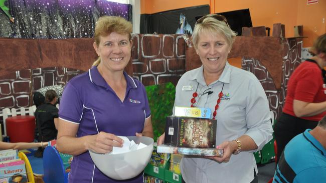 Bowen Toyworld's Sue Mawhirt and Whitsunday Regional Council Community and Environment director Julie Wright draw the winners of the Bowen Library Summer Reading Club in 2017.