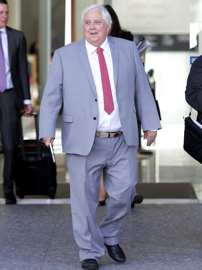 Clive Palmer outside the District and Supreme Courts in Brisbane on Monday. Picture: AAP Image/Josh Woning