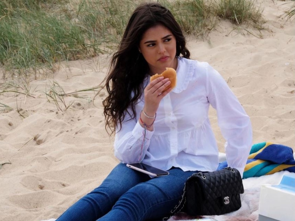 Her cheese roll lunch was far removed from the luxury restaurants she was used to. Picture: Ruth Board/Kalel