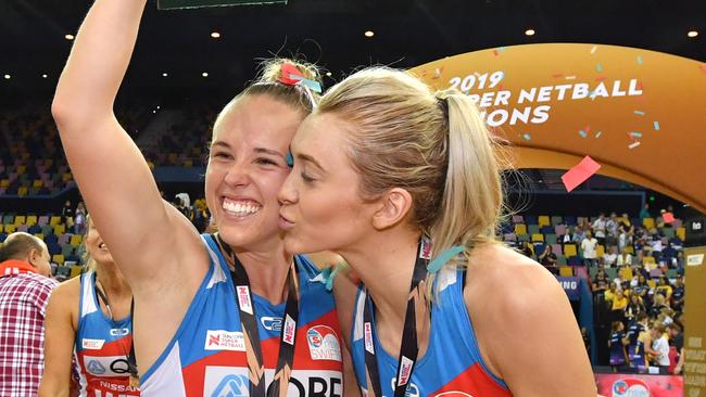 Paige Hadley (left) and Helen Housby (right) of the Swifts celebrates winning the Super Netball season decider in 2019. Hadley has been a leader for the Swifts on and off the court.