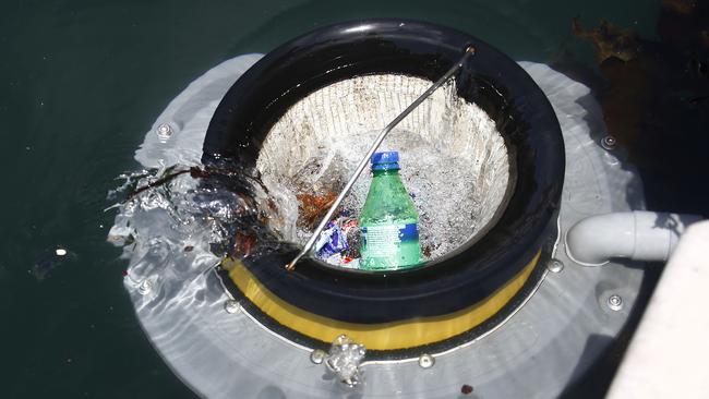 The seabin is like a pool filter which floats in the water and slowly takes in rubbish like plastic bags. Picture: John Appleyard