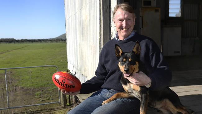 Man’s best friend: Gerard FitzGerald on his farm in Derrinallum with his Kelpie, Lizzie. Picture: Greg Scullin