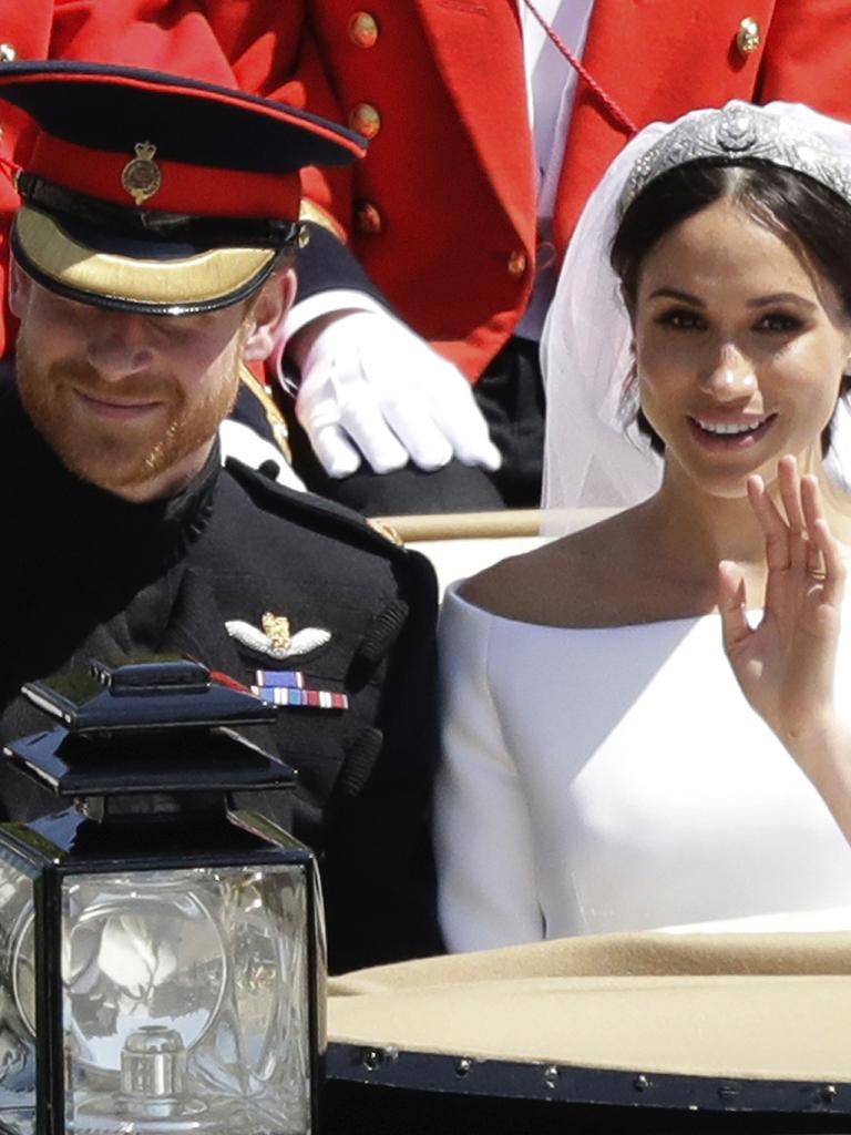 It didn’t seem to bother Meghan too much that Harry’s ex was in attendance. Picture: AP/Matt Dunham