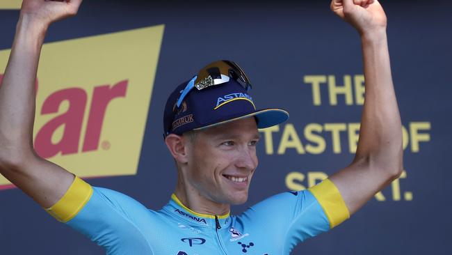 Denmark's Magnus Cort Nielsen celebrates on the podium after the fifteenth stage of the Tour de France cycling race over 181.5 kilometres (112.8 miles) with start in Millau and finish in Carcassonne, France, France, Sunday July 22, 2018. (AP Photo/Christophe Ena)