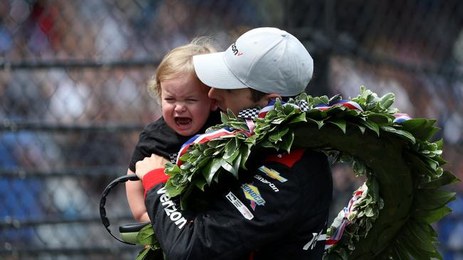 Will Power with his son, Beau William, after winning the Indianapolis 500.