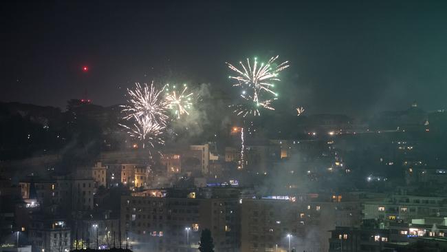 Fireworks are seen over the city of Rome while people celebrate New Year's Eve during the Coronavirus pandemic. Picture: Getty