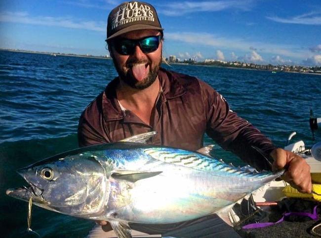 Jadeo Schmidt with a tuna he caught off the Gold Coast.