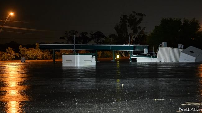 Camden Petroleum Service Station with floating refrigerators and shipping containers. Picture: Brett Atkins