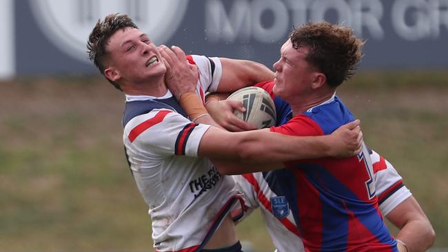 Roosters’ forward Tulsyn McCulloch tackling Newcastle’s Noah McNamara. Picture: Sue Graham