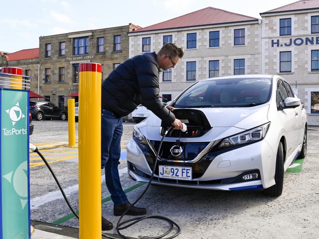 Anton Vikstrom, co-founder of The Good Car Company, charges an electric vehicle at Hunter Street, Hobart. Supplied: TasPorts